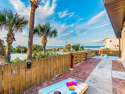 corn hole looking out at the beach